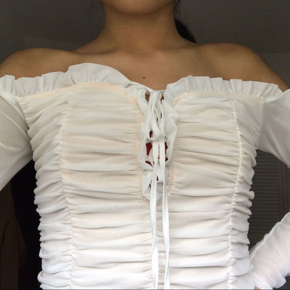 white cinched bodysuit🤍